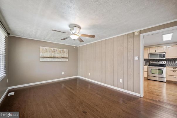 Empty room, Interior, Kitchen, Stainless Steel Appliances, Wood Texture Flooring