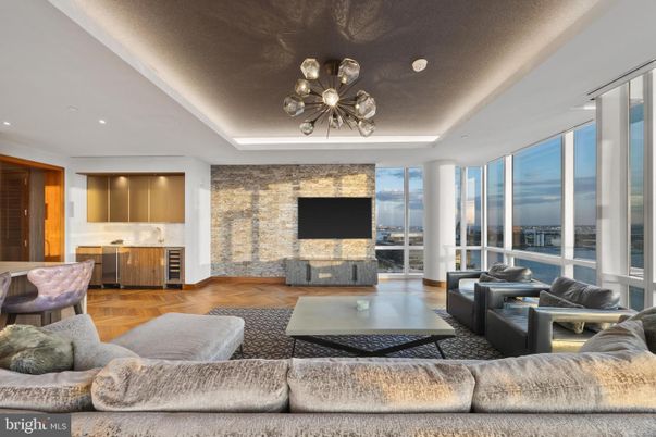 Fireplace, Interior, Living room, Pendant Lights, Recessed Lighting, Stone Walls, Wood Texture Flooring