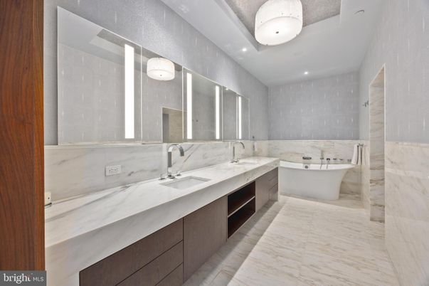 Bathroom, Dual Sink Vanities, Free Standing Baths, Interior, Marble, Marble Walls, Recessed Lighting