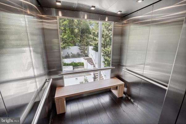 Elevator, Interior, Recessed Lighting, Wood Texture Flooring