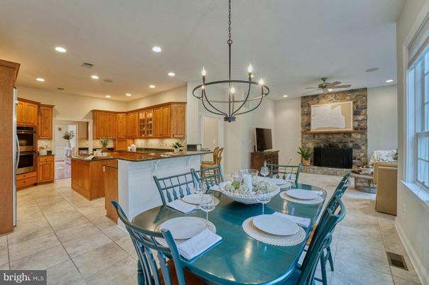 Chandelier, Dining room, Fireplace, Interior, Kitchen, Recessed Lighting, Stone Walls