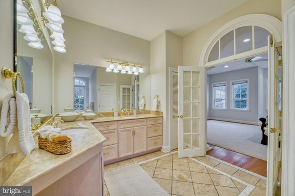 Bathroom, Dual Sink Vanities, Interior, Recessed Lighting, Wood Texture Flooring