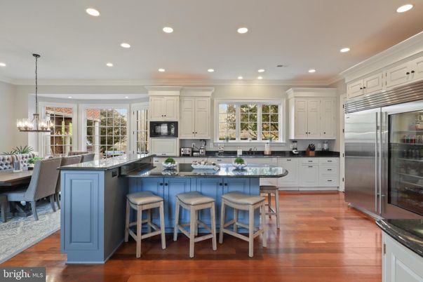 Chandelier, Dining room, Interior, Kitchen, Recessed Lighting, Stainless Steel Appliances, Wood Texture Flooring