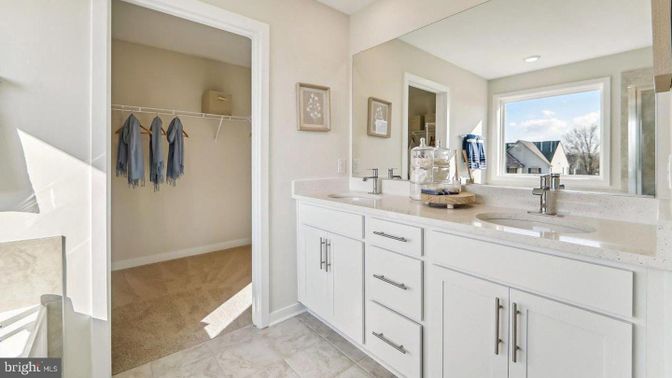 Bathroom, Dual Sink Vanities, Interior, Recessed Lighting, Walk-in Closets