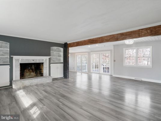 Chandelier, Empty room, Fireplace, Interior, Recessed Lighting, Wood Texture Flooring