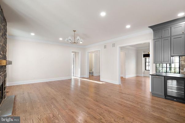 Chandelier, Empty room, Fireplace, Interior, Recessed Lighting, Wood Texture Flooring