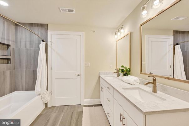Bathroom, Dual Sink Vanities, Interior, Recessed Lighting, Wood Texture Flooring