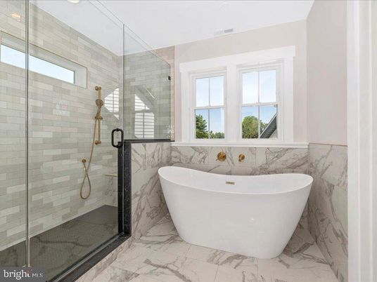 Bathroom, Free Standing Baths, Glass Shower, Interior, Marble, Marble Walls, Recessed Lighting