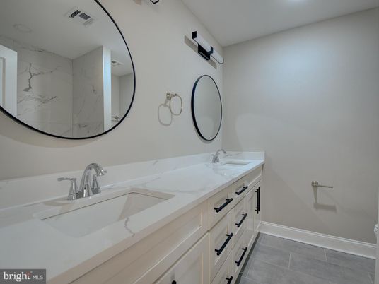 Bathroom, Dual Sink Vanities, Interior, Marble Walls, Recessed Lighting