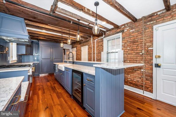 Interior, Kitchen, Pendant Lights, Stainless Steel Appliances, Stone Walls, Wooden Beams, Wood Texture Flooring