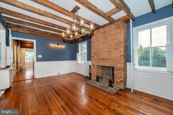 Chandelier, Empty room, Fireplace, Interior, Stone Walls, Wooden Beams, Wood Texture Flooring