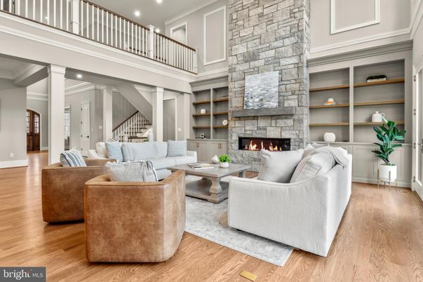 Fireplace, Interior, Living room, Recessed Lighting, Stone Walls, Wood Texture Flooring