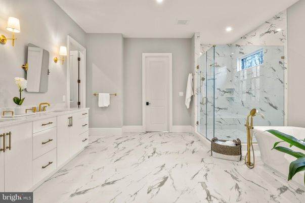 Bathroom, Dual Sink Vanities, Glass Shower, Interior, Marble, Marble Walls, Recessed Lighting