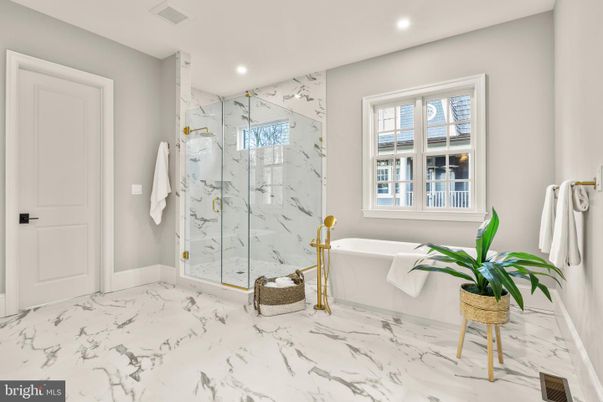 Bathroom, Free Standing Baths, Glass Shower, Interior, Marble, Marble Walls, Recessed Lighting