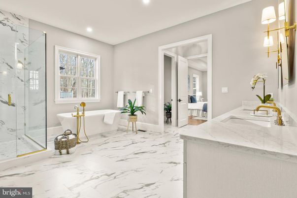 Bathroom, Dual Sink Vanities, Free Standing Baths, Glass Shower, Interior, Marble, Marble Walls, Recessed Lighting
