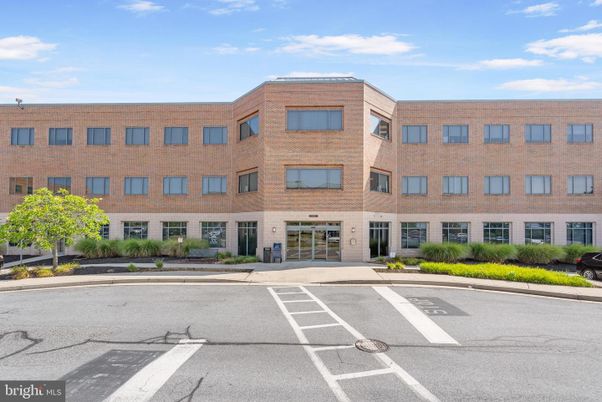 Exterior, Facade, Brick Facade, Condo Building