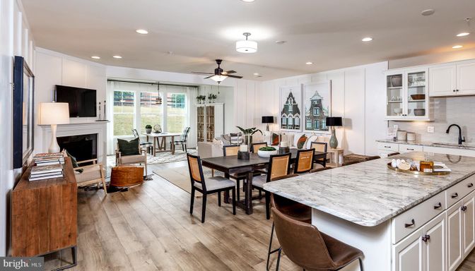 Dining room, Fireplace, Interior, Kitchen, Living room, Recessed Lighting, Wood Texture Flooring