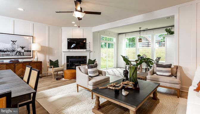 Dining room, Fireplace, Interior, Living room, Recessed Lighting, Wood Texture Flooring