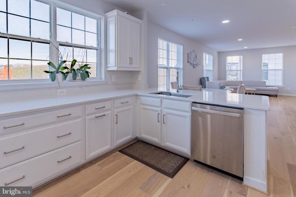 Dining room, Interior, Kitchen, Recessed Lighting, Stainless Steel Appliances, Wood Texture Flooring