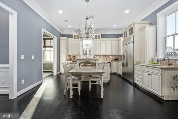 Chandelier, Dining room, Interior, Kitchen, Recessed Lighting, Stainless Steel Appliances, Wood Texture Flooring