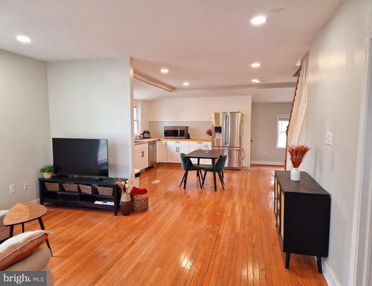 Dining room, Interior, Kitchen, Recessed Lighting, Stainless Steel Appliances, Wood Texture Flooring