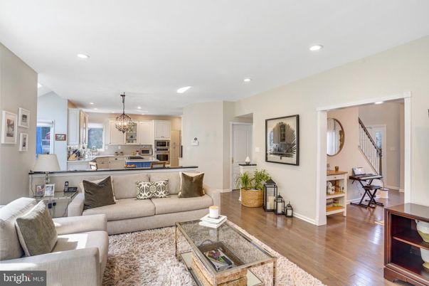 Chandelier, Interior, Kitchen, Living room, Pendant Lights, Recessed Lighting, Stainless Steel Appliances, Wood Texture Flooring