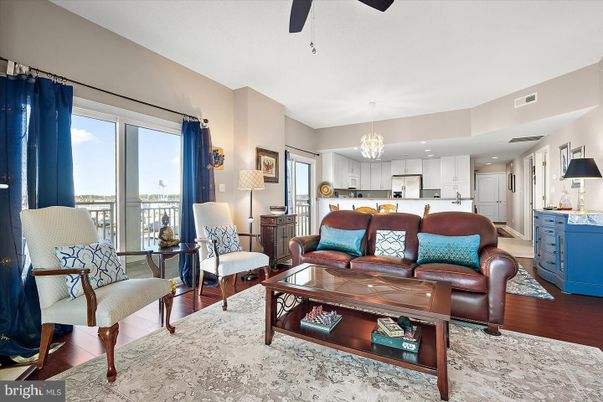 Chandelier, Interior, Kitchen, Living room, Recessed Lighting, Stainless Steel Appliances, Wood Texture Flooring