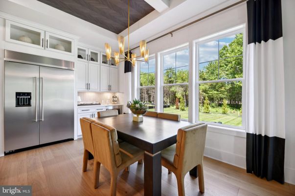 Chandelier, Dining room, Interior, Kitchen, Stainless Steel Appliances, Wood Texture Flooring