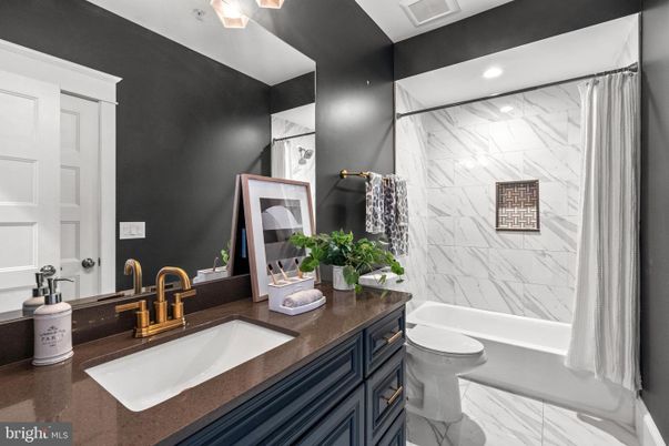 Bathroom, Dual Sink Vanities, Interior, Marble, Marble Walls, Recessed Lighting
