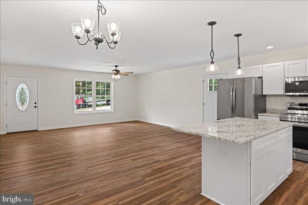 Chandelier, Interior, Kitchen, Pendant Lights, Recessed Lighting, Stainless Steel Appliances, Wood Texture Flooring