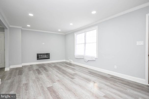 Empty room, Fireplace, Interior, Recessed Lighting, Wood Texture Flooring