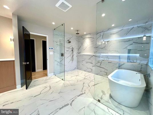 Bathroom, Free Standing Baths, Glass Shower, Interior, Marble, Marble Walls, Recessed Lighting