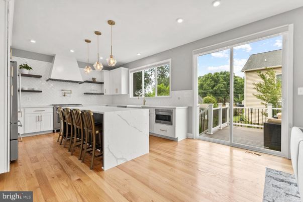 Interior, Kitchen, Marble Walls, Pendant Lights, Recessed Lighting, Wood Texture Flooring