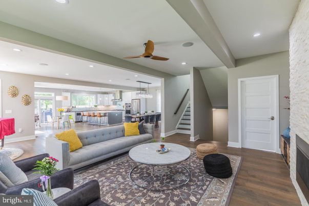 Dining room, Fireplace, Interior, Kitchen, Living room, Pendant Lights, Recessed Lighting, Stainless Steel Appliances, Wood Texture Flooring