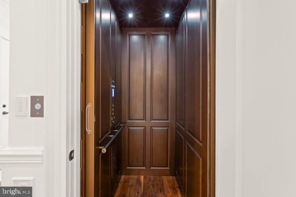 Elevator, Interior, Recessed Lighting, Wood Texture Flooring, Wooden Walls