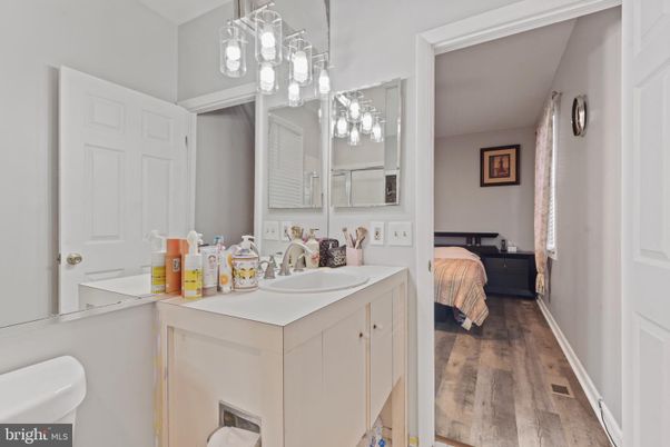 Bathroom, Bedroom, Dual Sink Vanities, Interior, Pendant Lights, Wood Texture Flooring