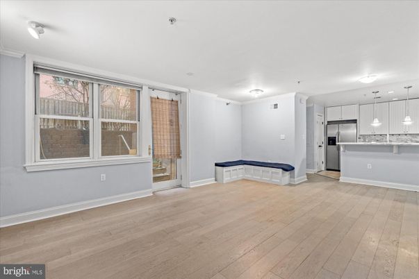 Empty room, Interior, Kitchen, Pendant Lights, Stainless Steel Appliances, Wood Texture Flooring