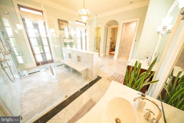 Bathroom, Chandelier, Dual Sink Vanities, Glass Shower, Interior, Pendant Lights