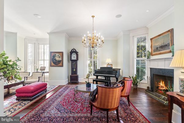 Chandelier, Fireplace, Interior, Living room, Piano, Recessed Lighting, Wood Texture Flooring