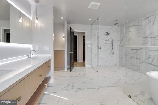 Bathroom, Dual Sink Vanities, Glass Shower, Interior, Marble, Marble Walls, Recessed Lighting