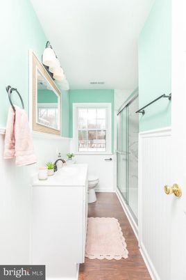 Bathroom, Glass Shower, Interior, Marble Walls, Wood Texture Flooring