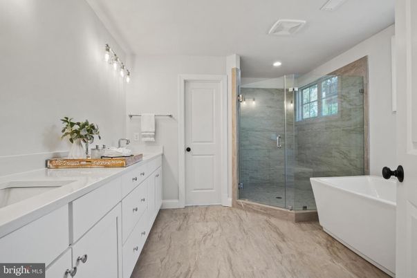 Bathroom, Dual Sink Vanities, Free Standing Baths, Glass Shower, Interior, Marble, Marble Walls, Recessed Lighting