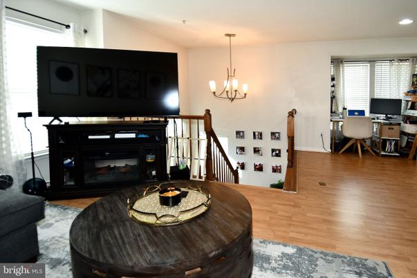 Chandelier, Dining room, Fireplace, Interior, Pendant Lights, Recessed Lighting, Wood Texture Flooring