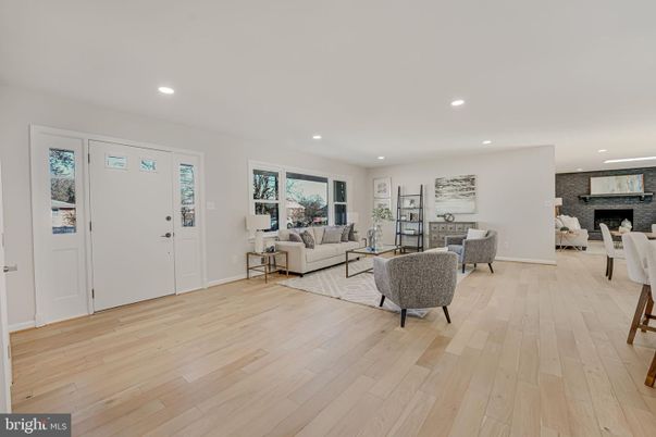 Fireplace, Interior, Living room, Recessed Lighting, Stone Walls, Wood Texture Flooring