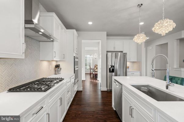 Chandelier, Interior, Kitchen, Pendant Lights, Recessed Lighting, Stainless Steel Appliances, Wood Texture Flooring