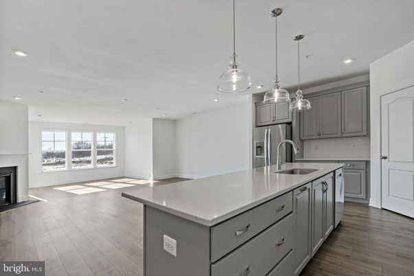 Fireplace, Interior, Kitchen, Pendant Lights, Recessed Lighting, Stainless Steel Appliances, Wood Texture Flooring