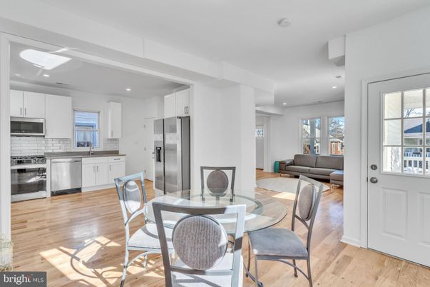 Dining room, Interior, Kitchen, Living room, Recessed Lighting, Stainless Steel Appliances, Wood Texture Flooring