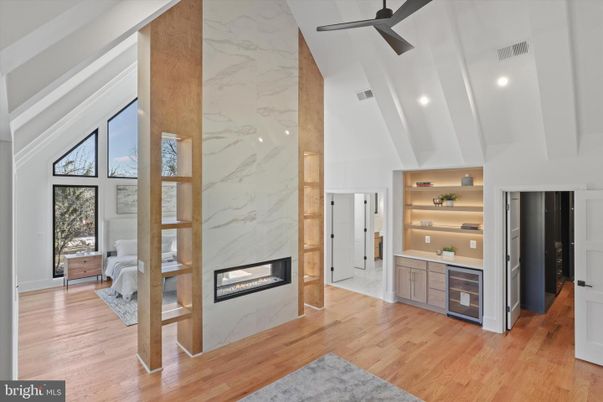 Fireplace, Interior, Marble Walls, Recessed Lighting, Wood Texture Flooring