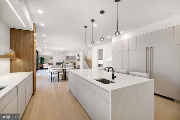 Chandelier, Dining room, Interior, Kitchen, Pendant Lights, Recessed Lighting, Stainless Steel Appliances, Wood Texture Flooring