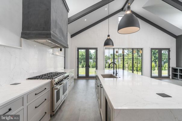 Interior, Kitchen, Marble Walls, Pendant Lights, Recessed Lighting, Stainless Steel Appliances, Wood Texture Flooring
